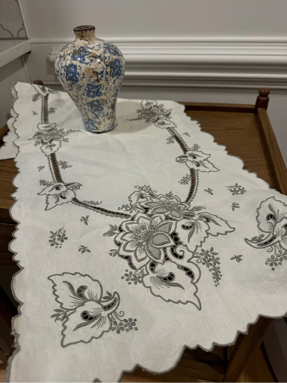 Elegant White Embroidered Linen Table Runner with Gray Floral Motif